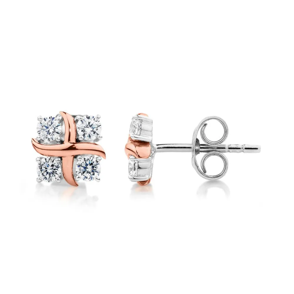 Round Brilliant fancy earrings with 0.48 carats* of diamond simulants in 10 carat rose gold and sterling silver