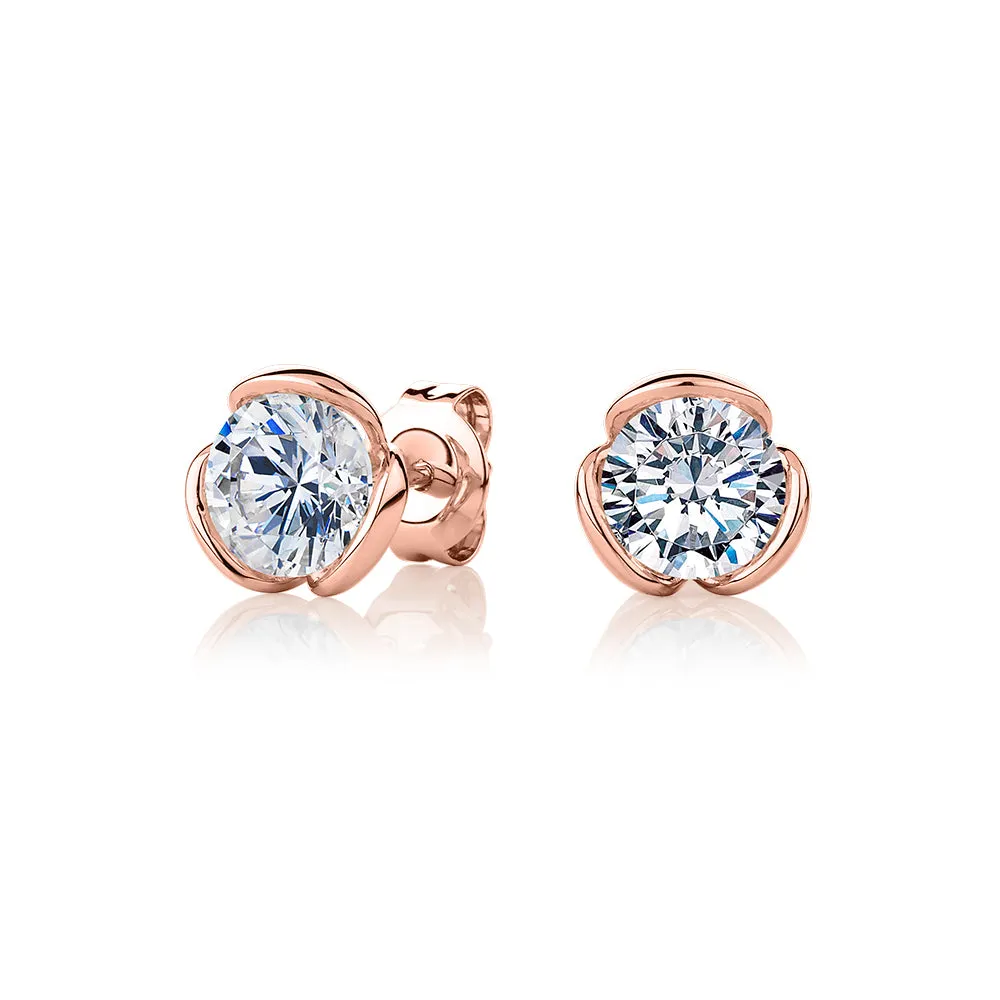 Round Brilliant stud earrings with 2 carats* of diamond simulants in 10 carat rose gold
